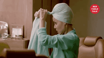 Jada Pinkett Smith wrapping her hair in a scarf