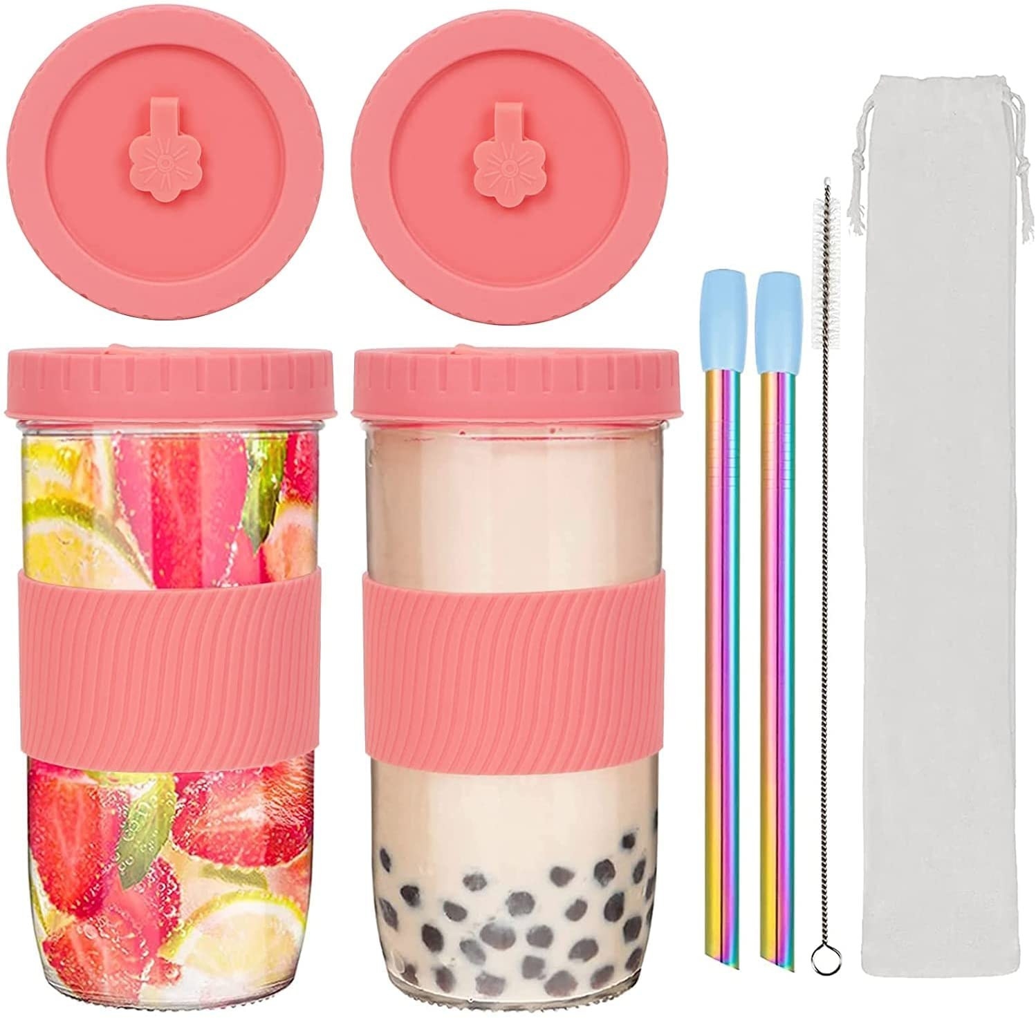 One tumbler filled with bubble tea and one with fruit, surrounded by lids, straws, a straw cleaner, and a straw holder