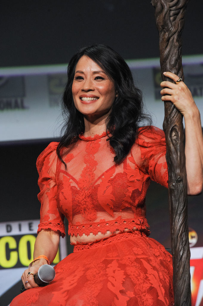 Lucy Liu speaks onstage at the Warner Bros. theatrical panel