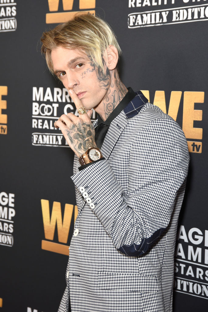Aaron Carter putting his finger to his lips