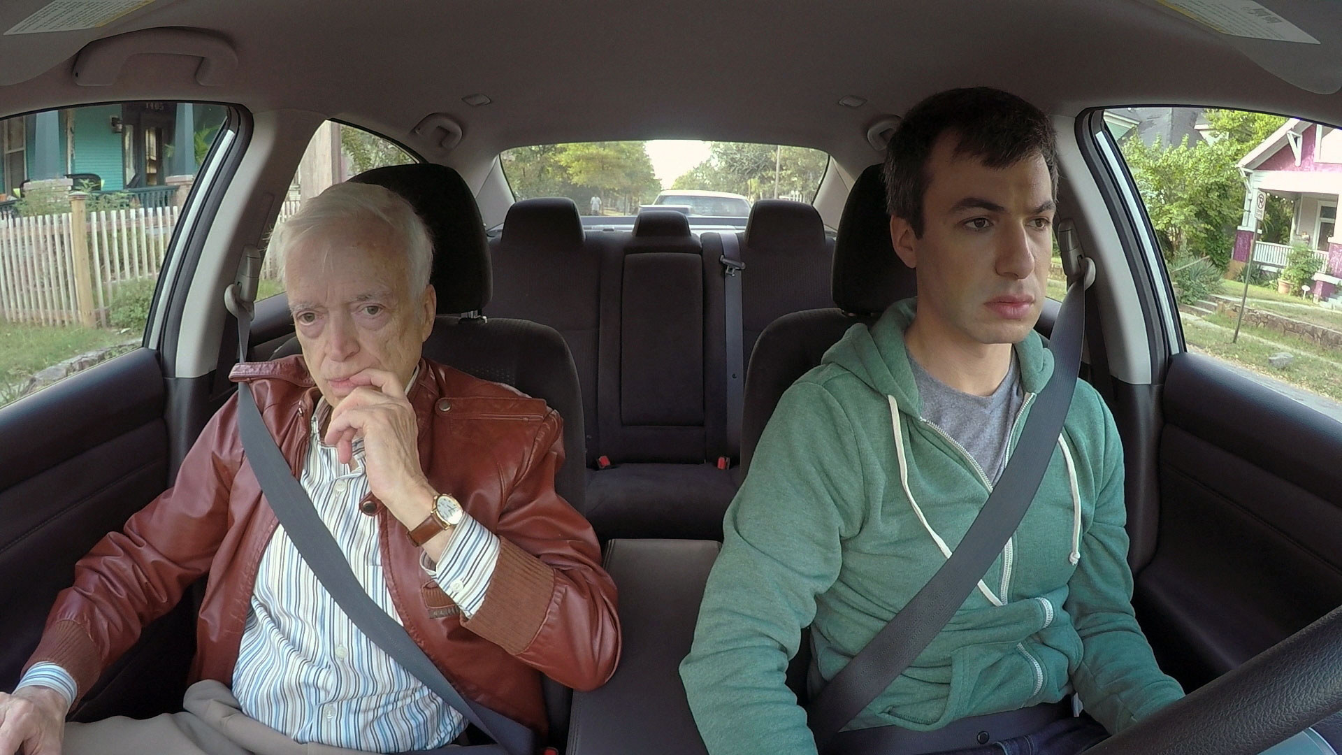 Nathan Fielder drives alongside Bill Heath, a celebrity impersonator he previously employed on &quot;Nathan For You.&quot;