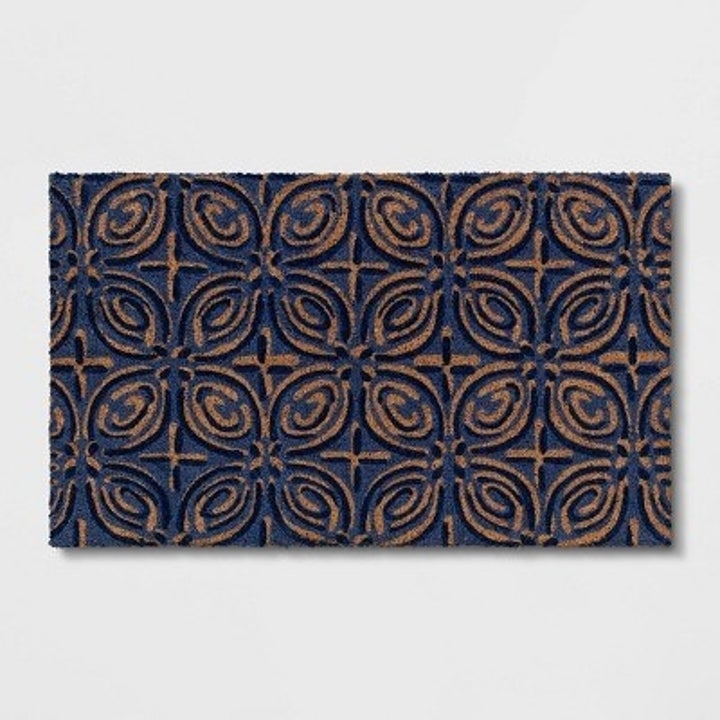 The blue geometric doormat
