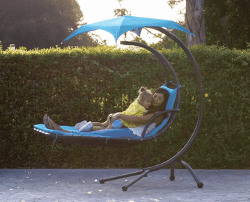 a gif of a person and a child on the blue swing