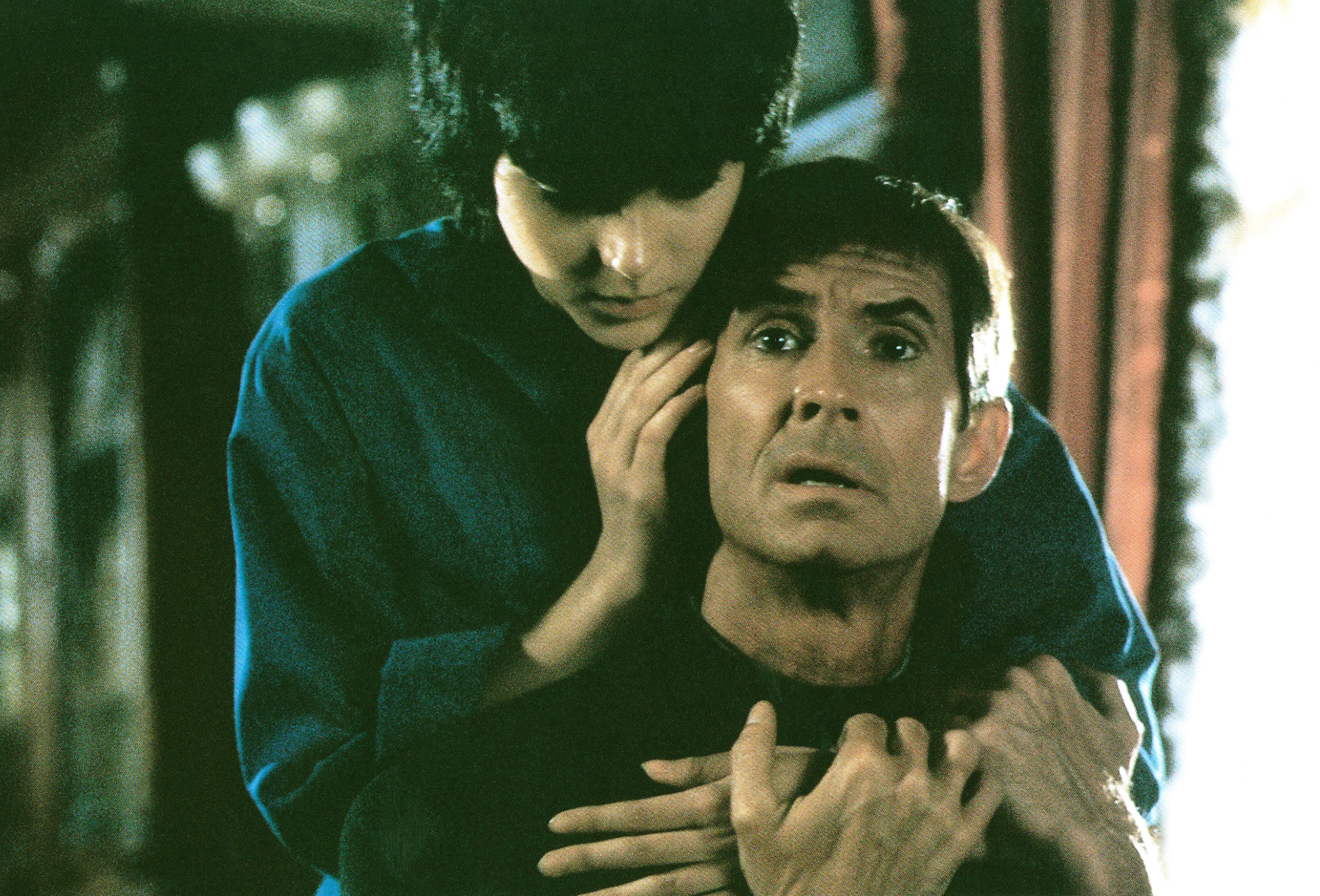 Anthony Perkins attempts to find solace in the embrace of Meg Tilly in &quot;Psycho II&quot;