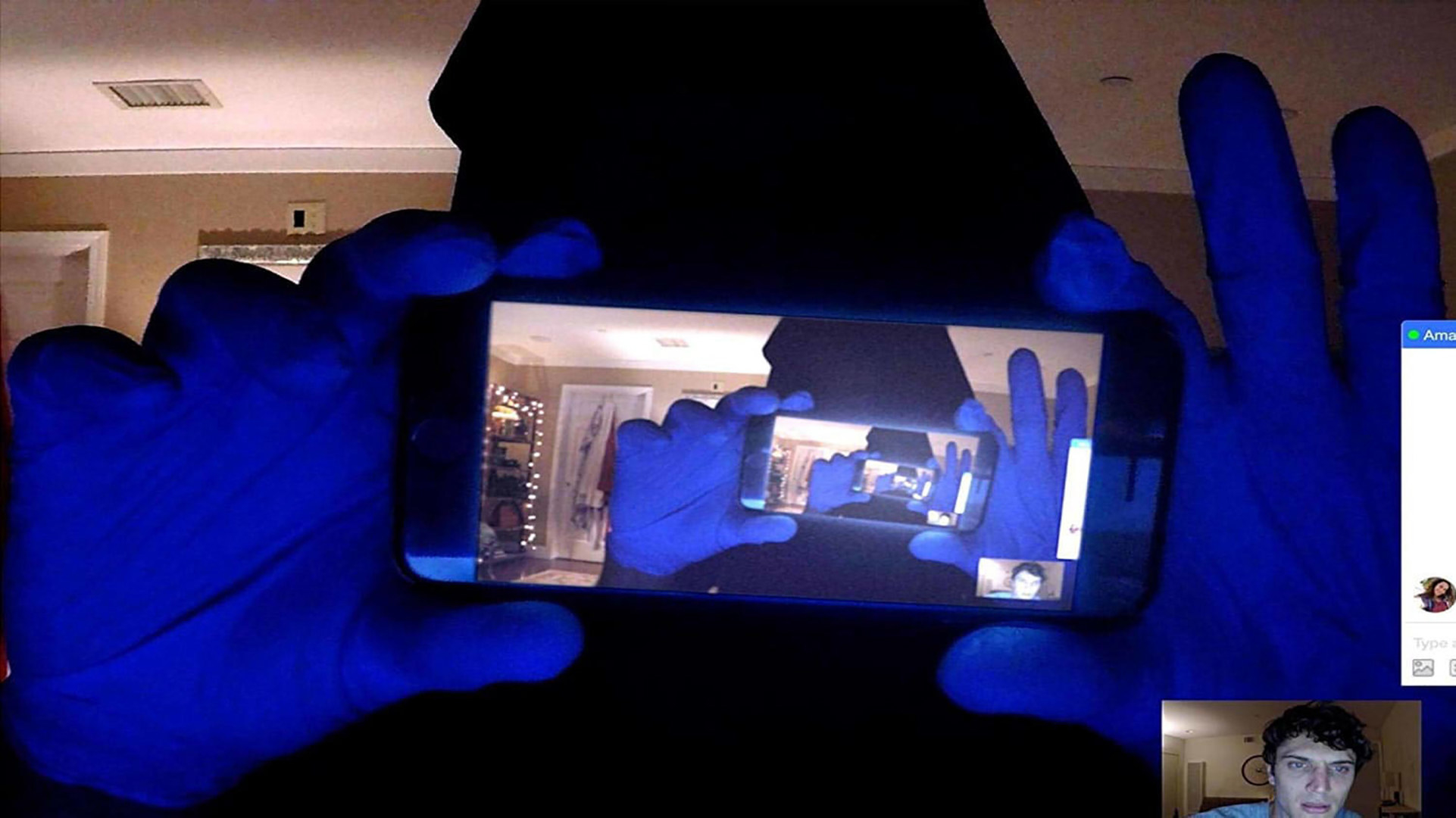An ominous figure demonstrates their terrifying technological prowess in &quot;Unfriended: Dark Web&quot;