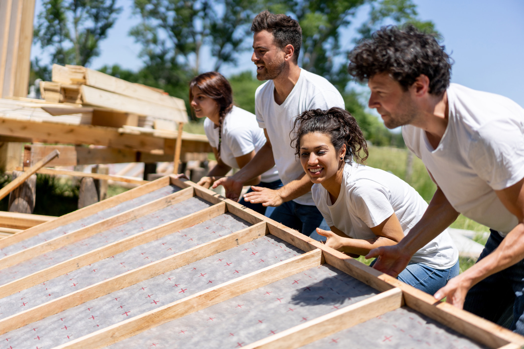 volunteers building a house