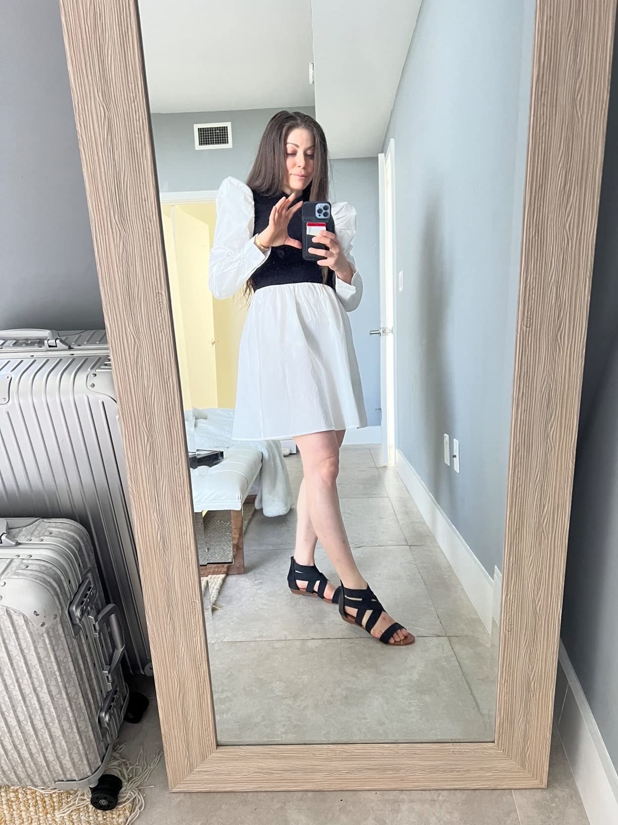 Amazon reviewer wearing black strappy sandals