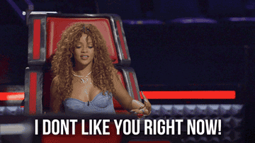 A gif of Rihanna at The Voice saying &#x27;i don&#x27;t like you right now&#x27;