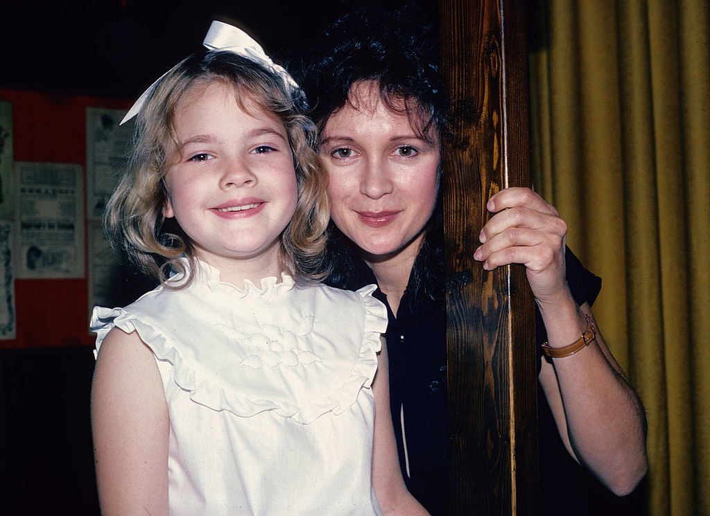 Drew as a child with her mom