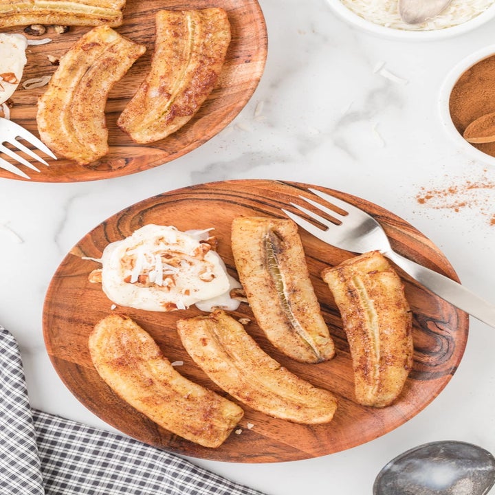 Cinnamon air fryer bananas on a plate.