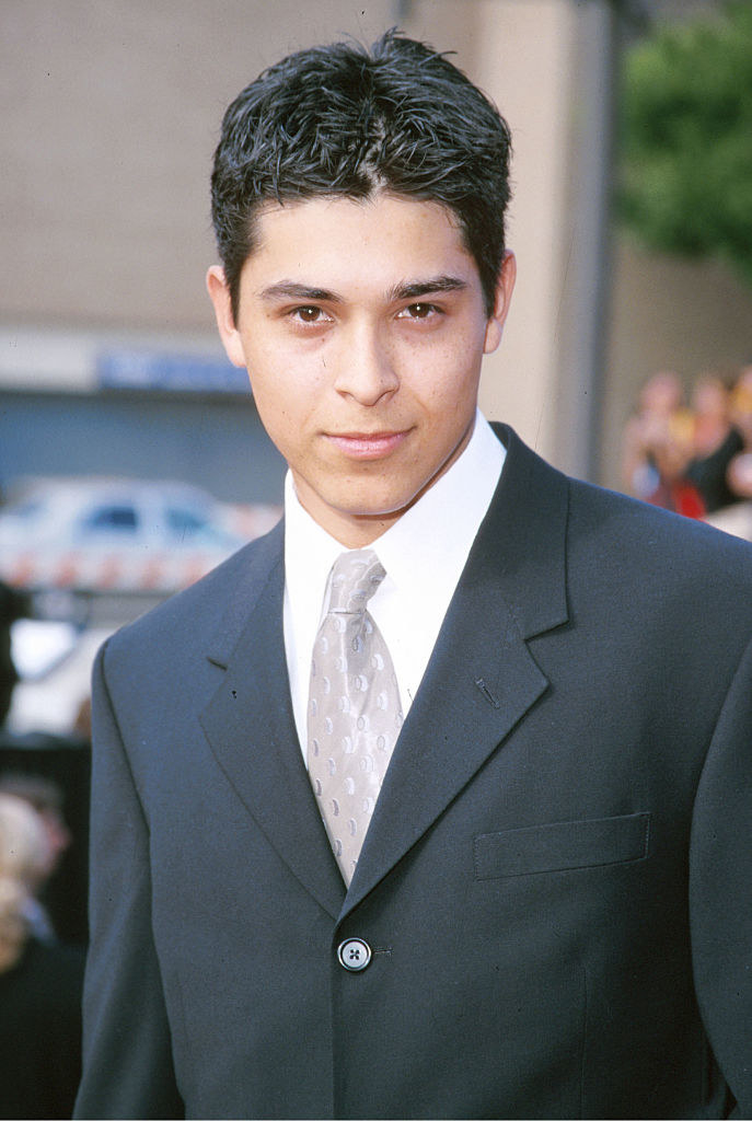 close up of wilmer in a suit