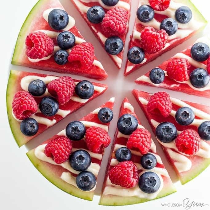 Watermelon &quot;pizza&quot; with berries and icing.