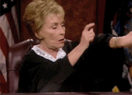 Judge Judy taps her watch