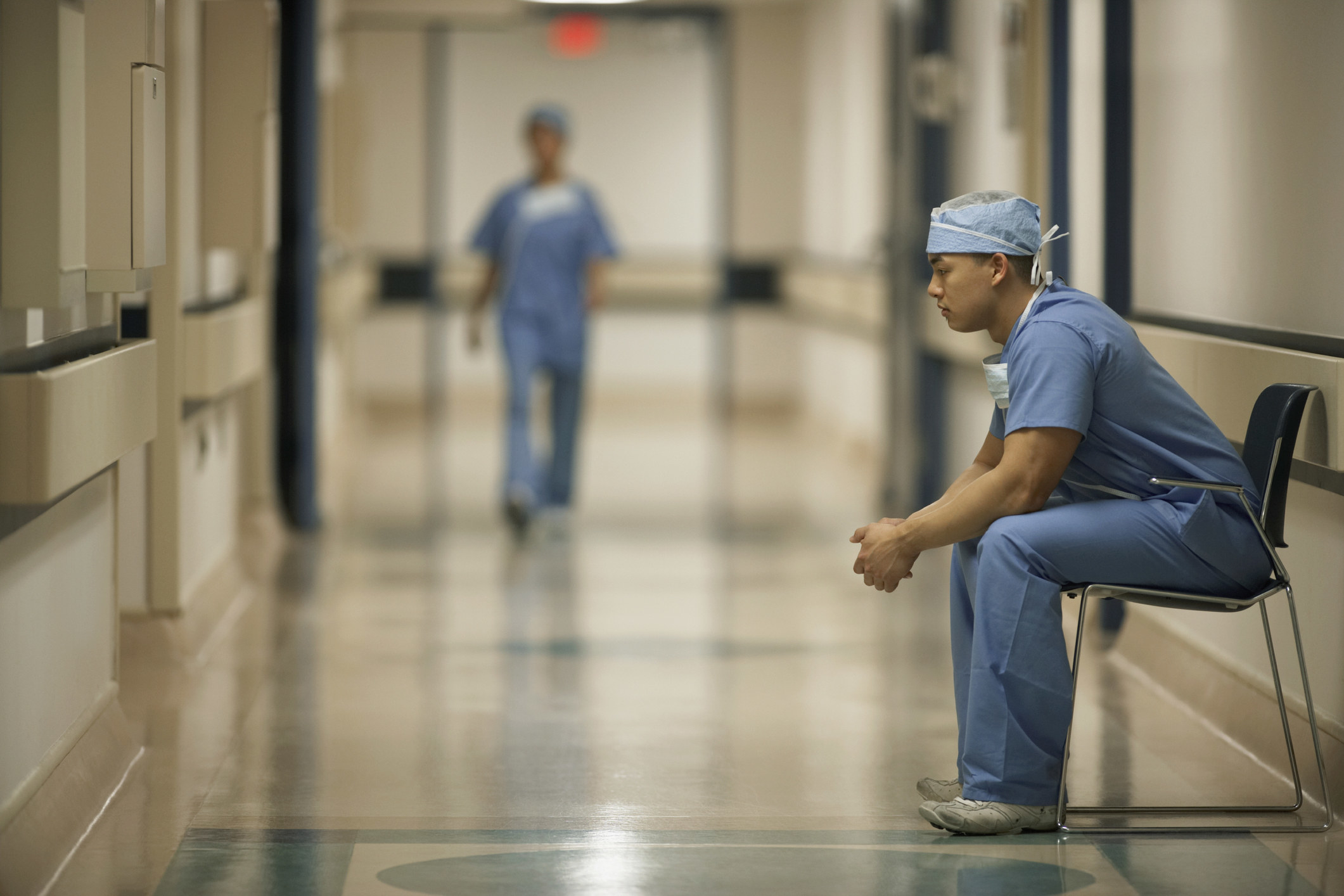 nurse sitting in the hallway