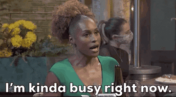 gif of Issa Rae talking to someone that reads I&#x27;m kinda busy right now