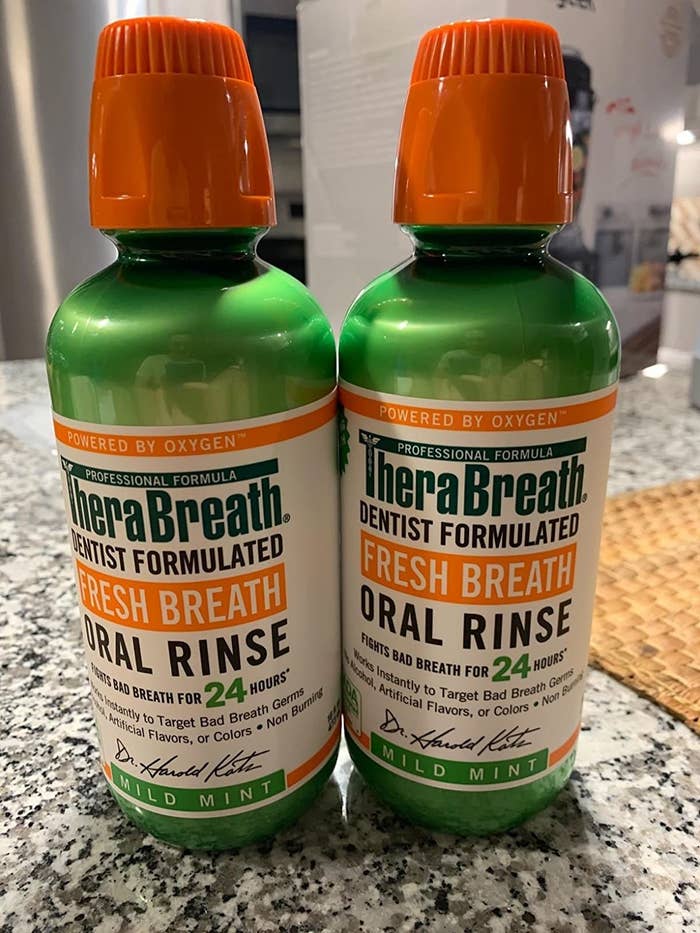 a review photo of the two bottles of mouthwash