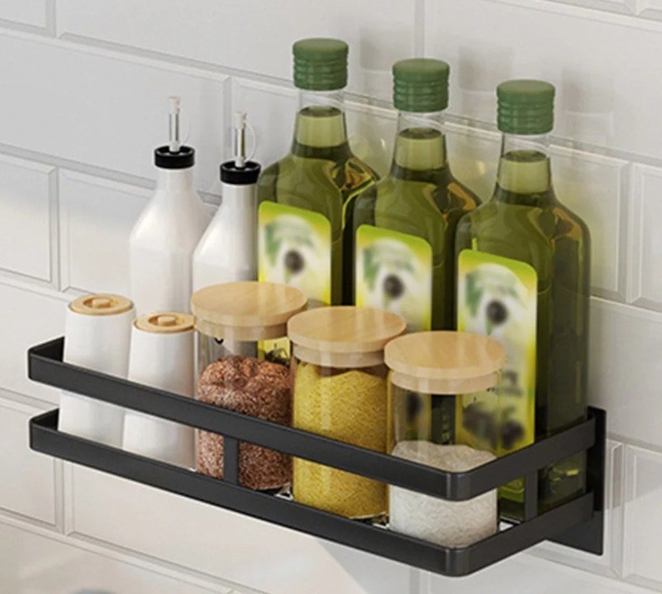 Estante de cocina montado en la pared hecho de acero inoxidable