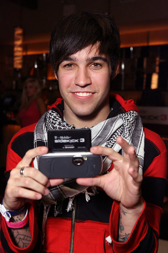 Pete holding up the Sidekick 3 phone