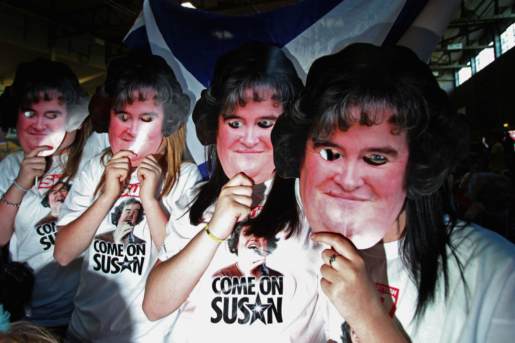 Fans wearing Susan masks and &quot;Come on Susan&quot; T-shirts