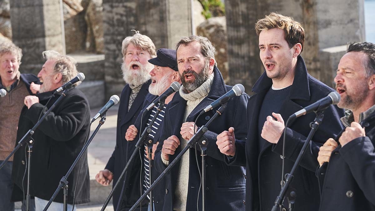 James Purefoy as Jim and the rest of the band singing in &quot;Fisherman&#x27;s Friends: One and All&quot;