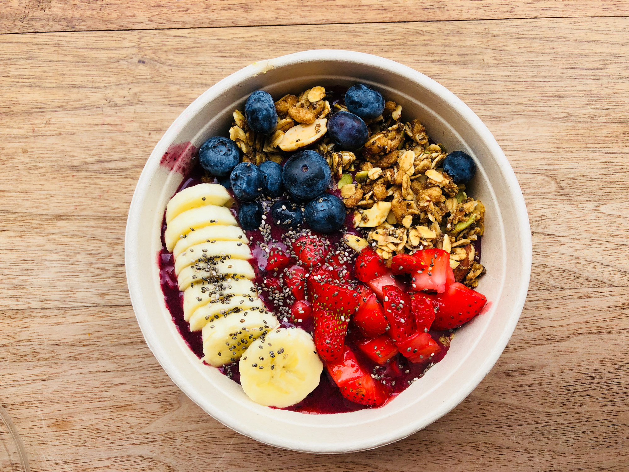 Acai bowl with fruits and seeds.