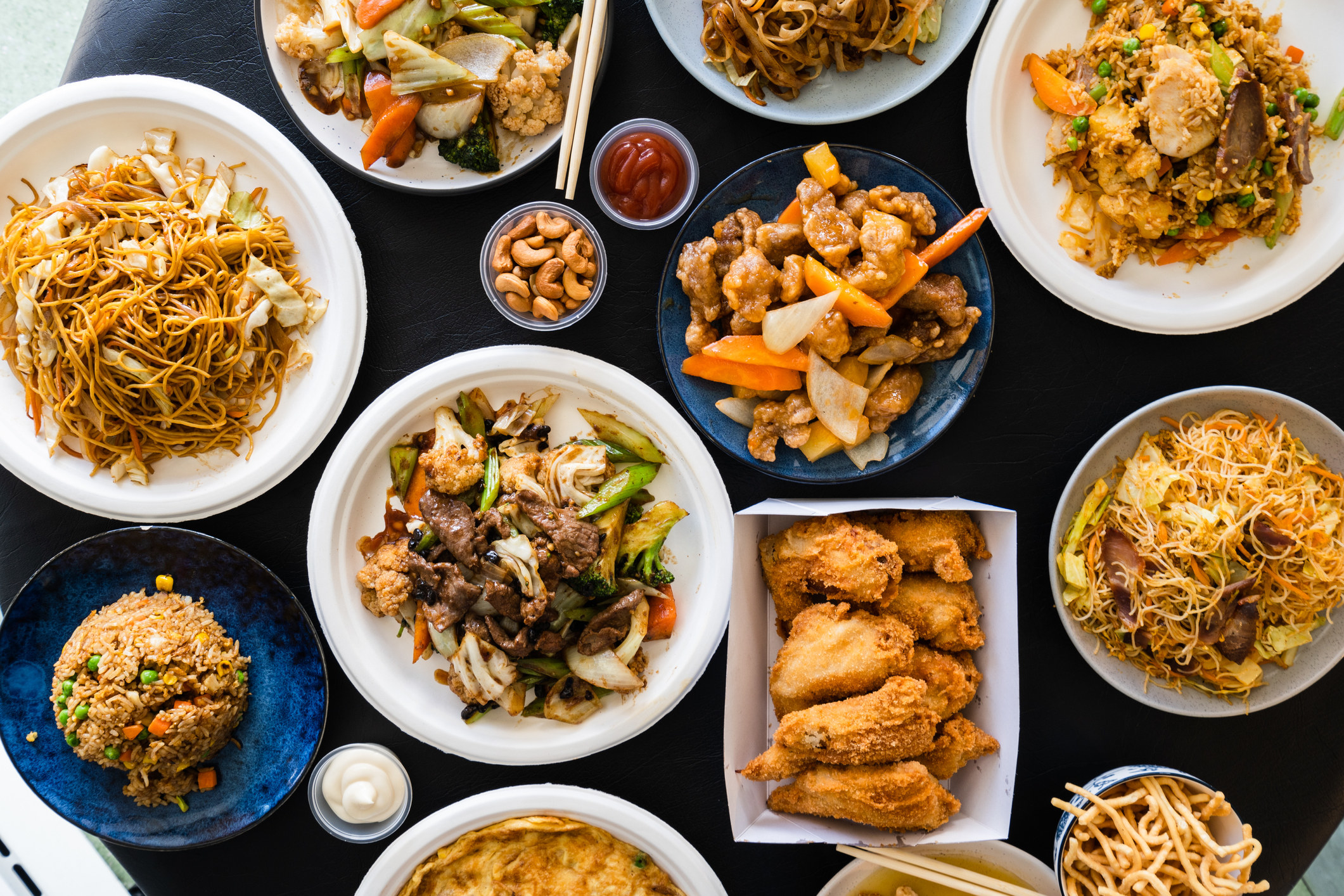 A table full of Chinese food.