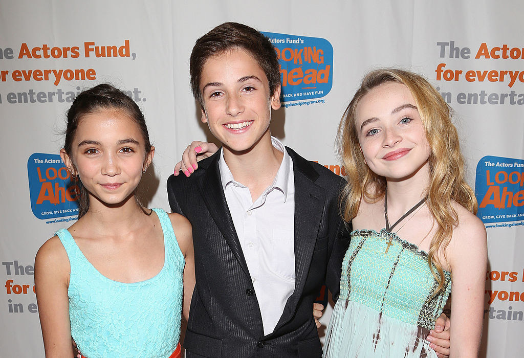 Teo Halm as a child with two other child actors