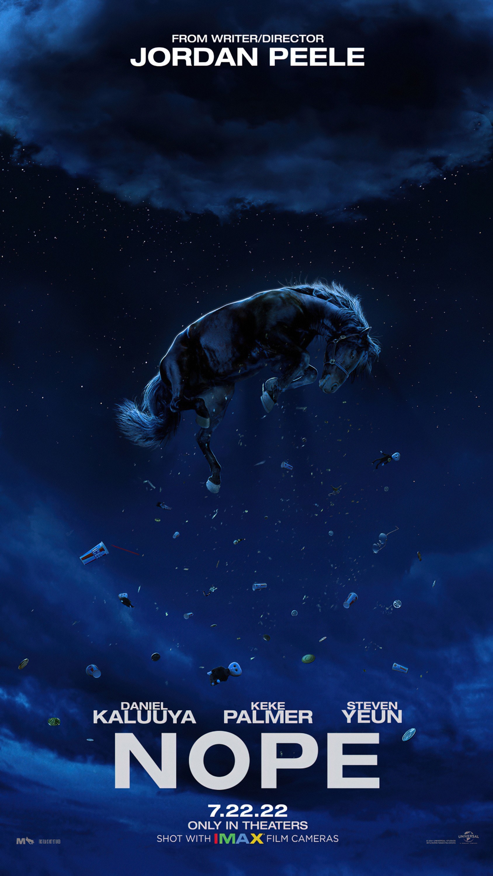 A Nope poster featuring a horse in the night sky along with a plethora of objects
