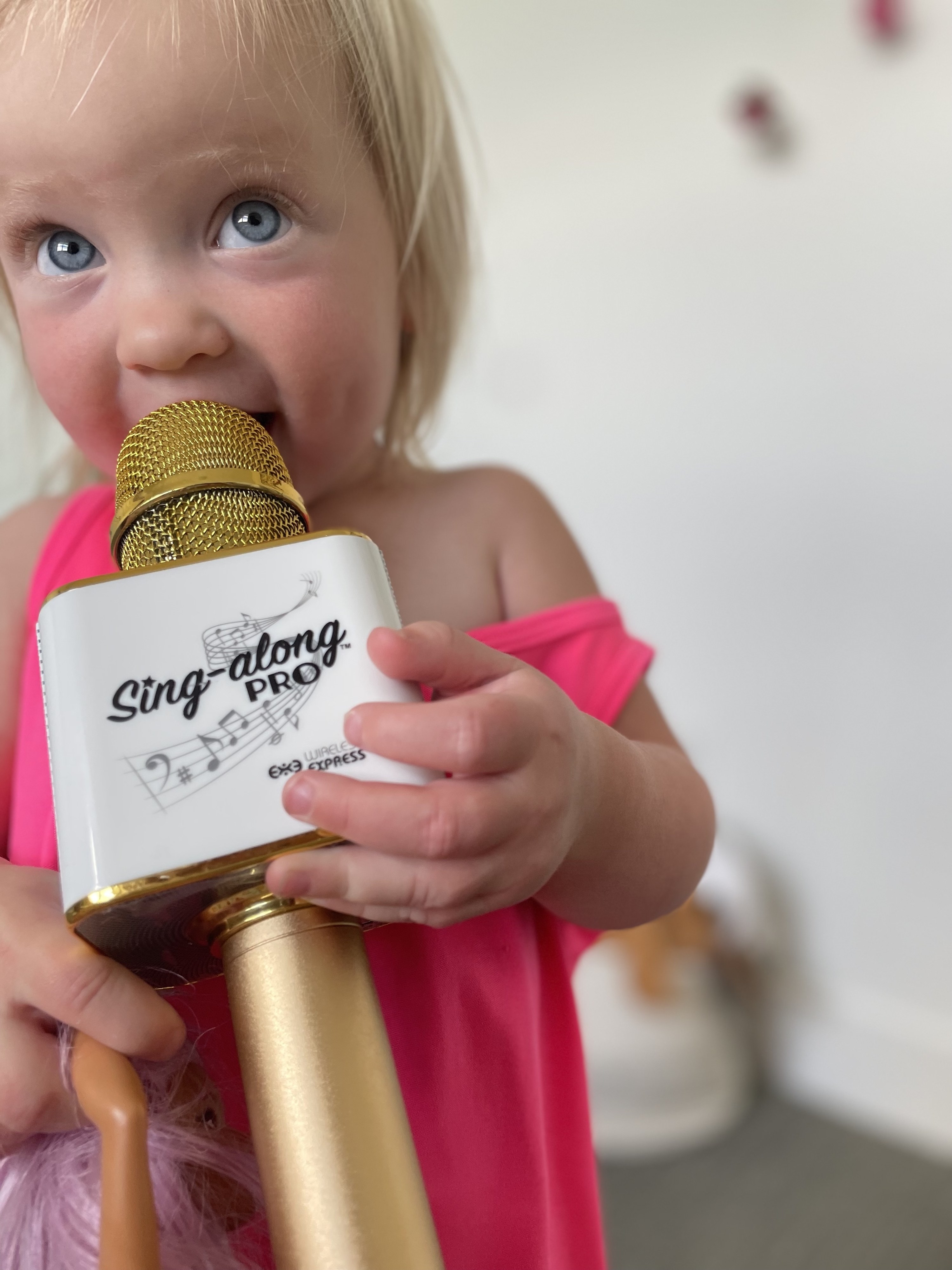author&#x27;s daughter with a microphone