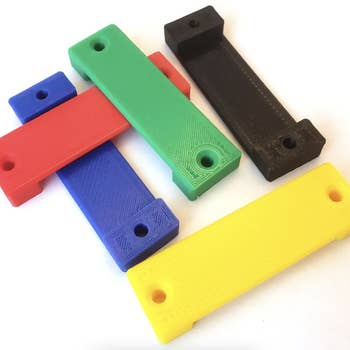 The measuring tape mounts are shown in a variety of colors