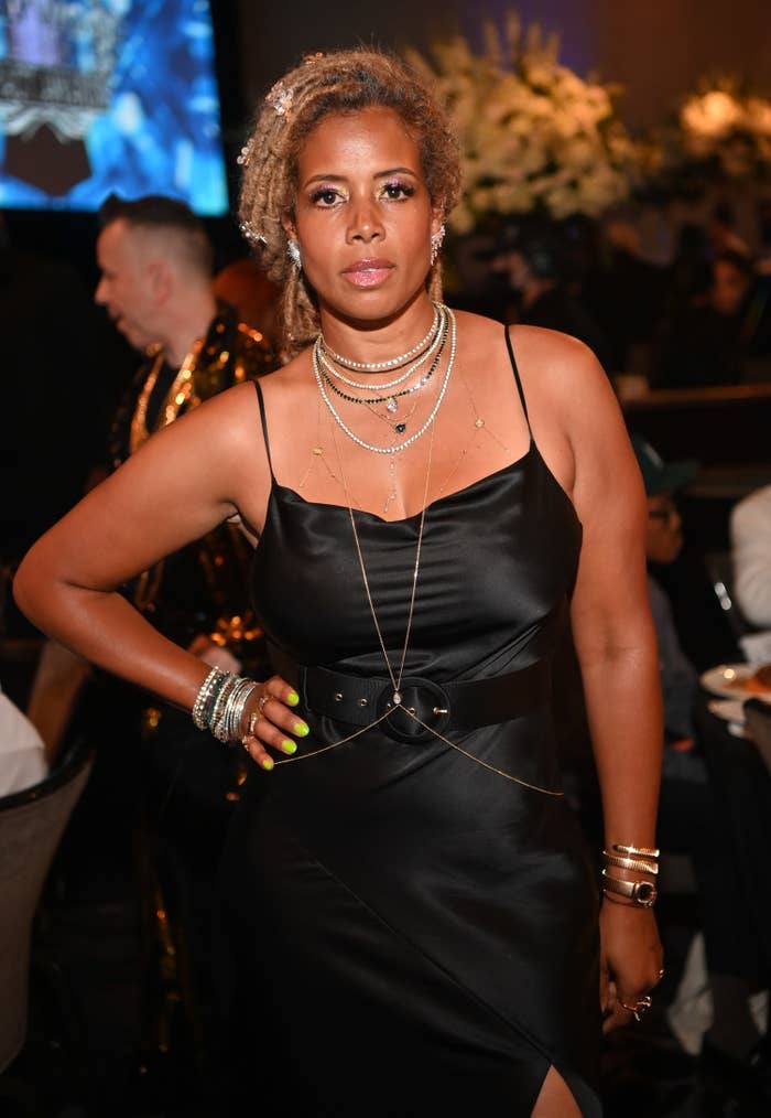 A closeup of Kelis with her hand on her hip