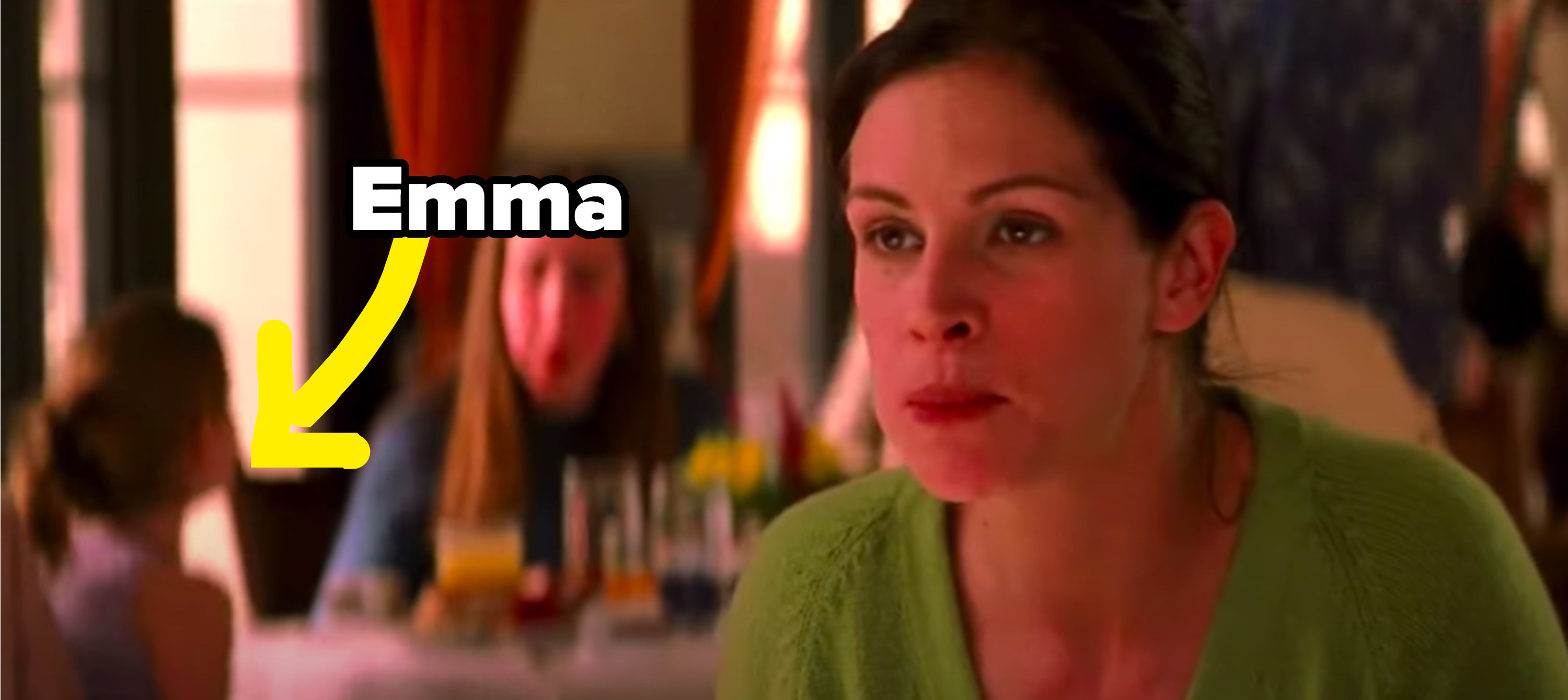 An arrow points out a child Emma in the background of a scene in America&#x27;s Sweethearts