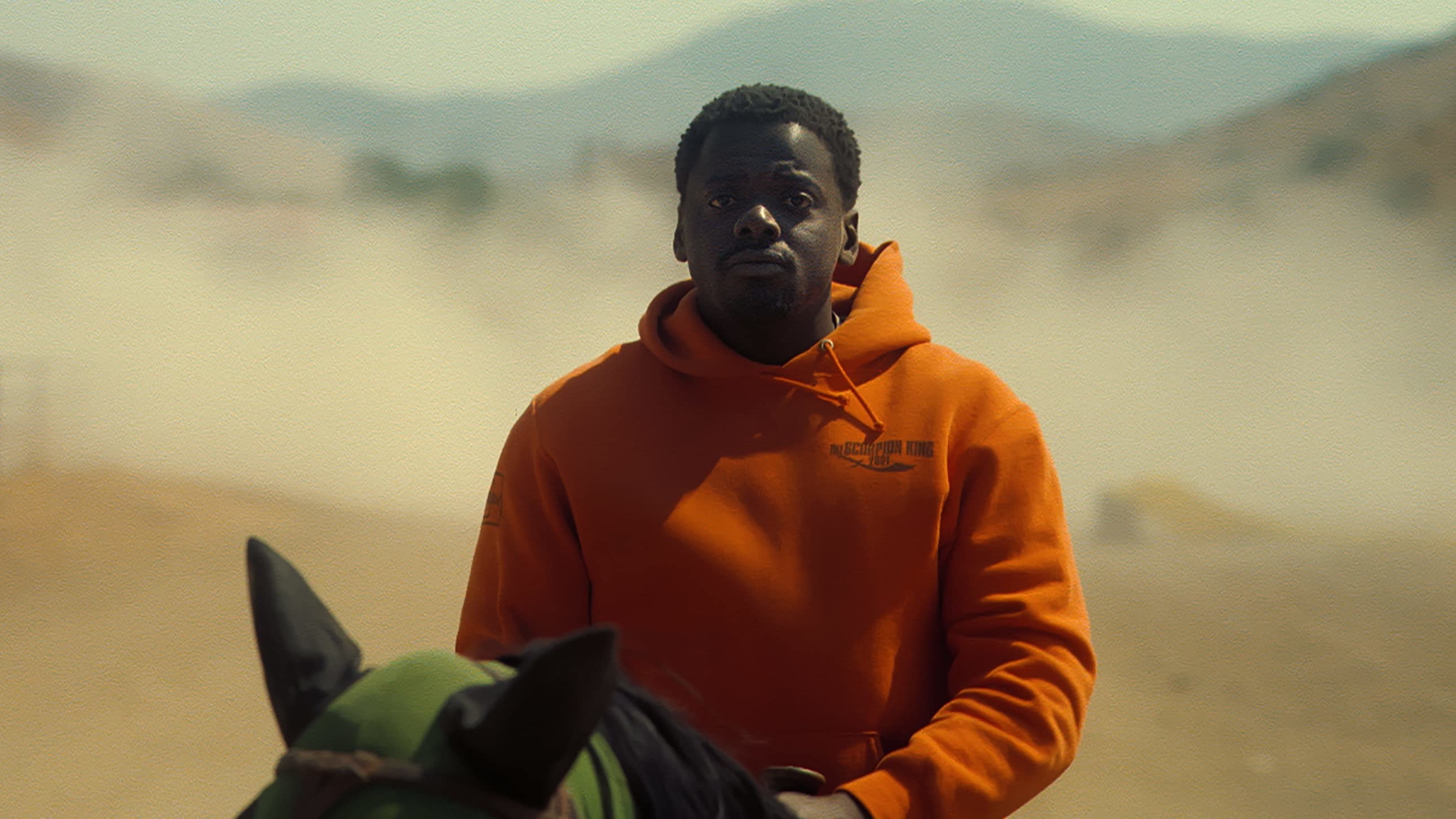 Daniel Kaluuya as OJ Haywood riding a horse in &quot;Nope&quot;