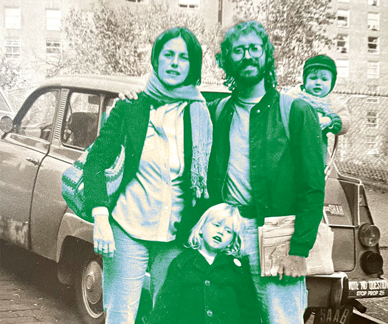 Bernardine, Bill, and their two children edited with a bright blue and green filter