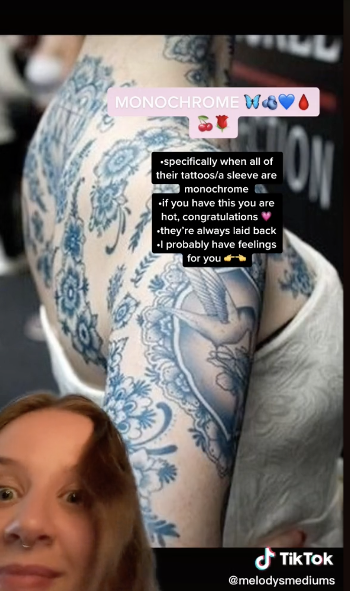 A screengrab from a TikTok by urtattoomommy sharing that monochrome tattoos are a green flag