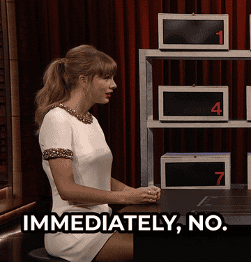 Taylor Swift shaking her head with the words &#x27;Immediately, no&#x27; on the screen