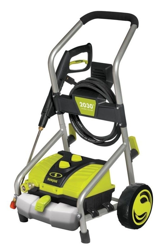 a green and black pressure washer