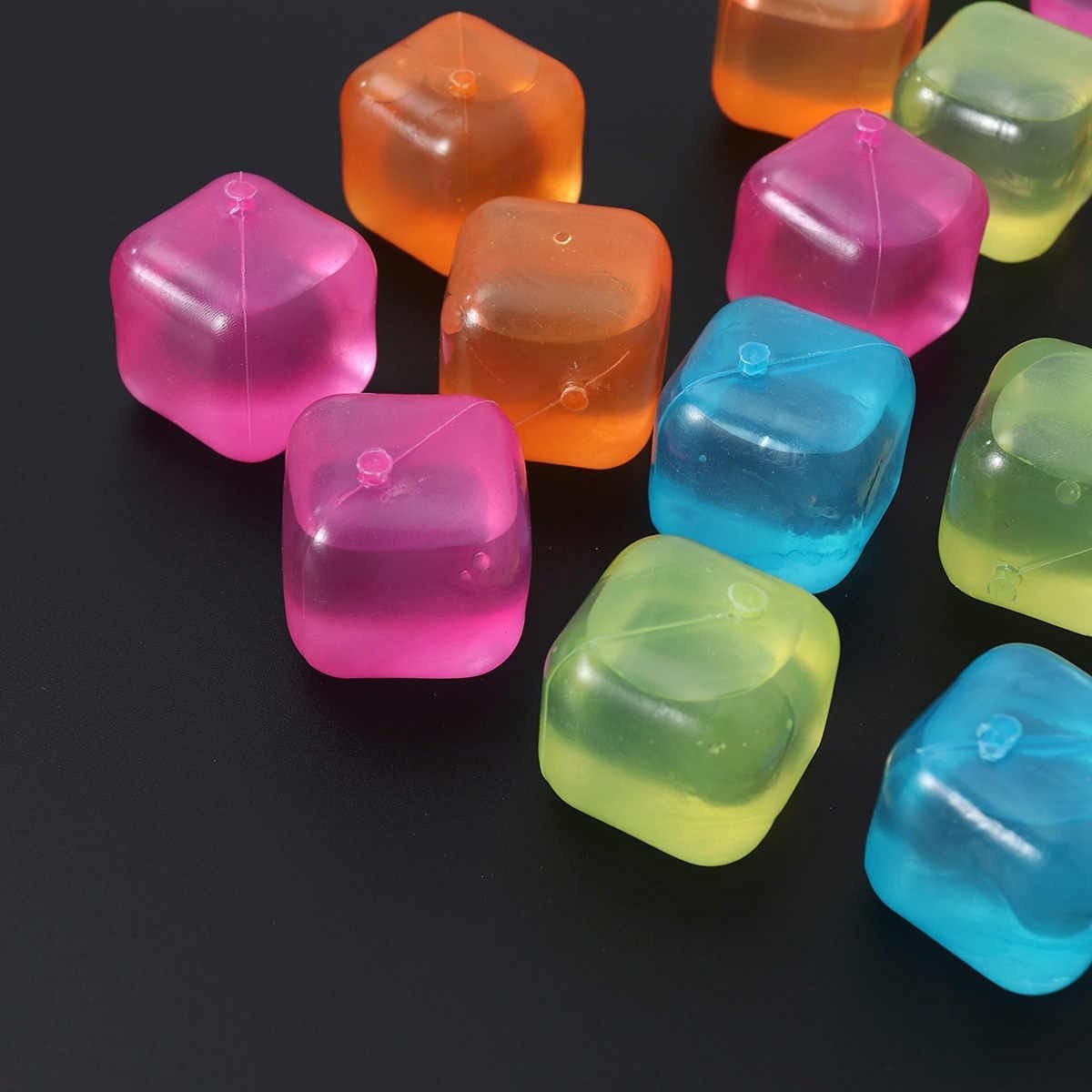 the reusable ice cubes on a plain dark background