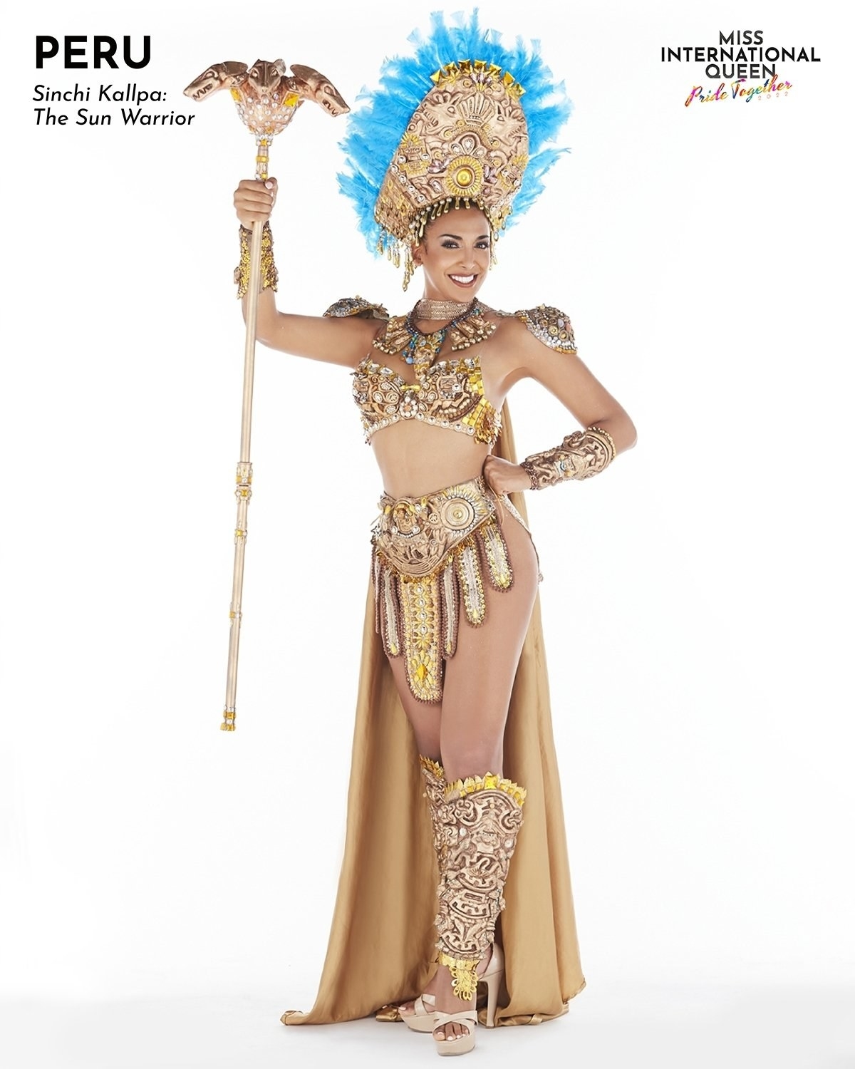 Miss Peru in a gold outfit with a gold staff and gold and blue headpiece