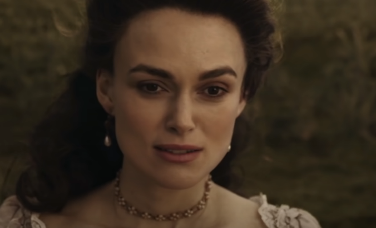 Close-up of Keira as Elizabeth wearing a necklace