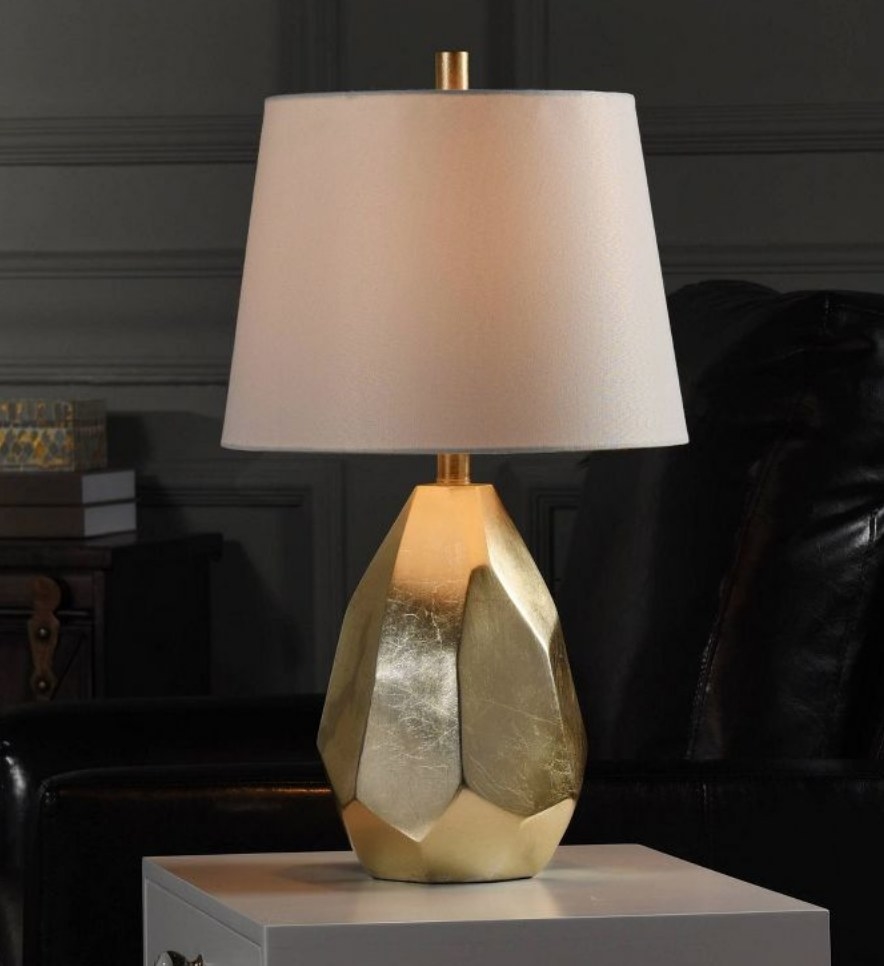 A gold accent lamp