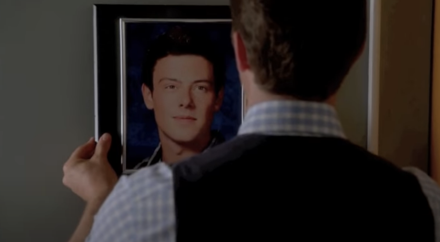 Someone hangs a picture of Finn on the wall