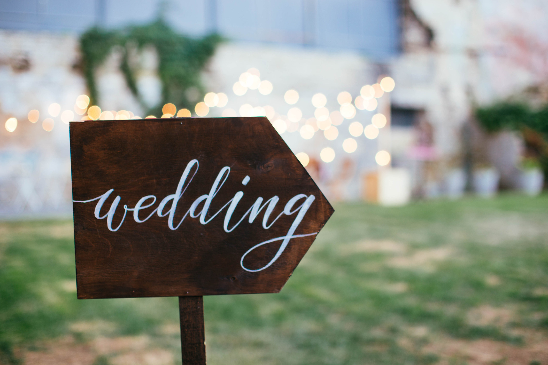 A sign saying, &quot;wedding&quot;