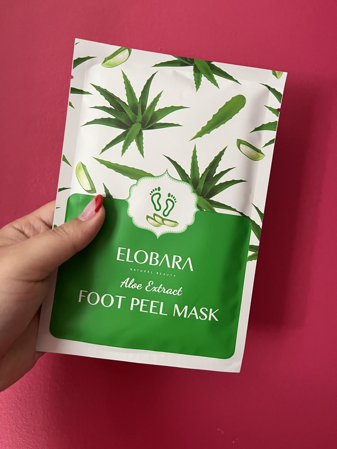 Bianca holding up a packet of the foot mask