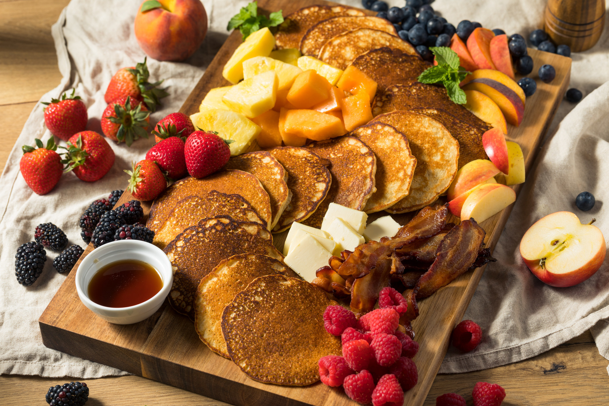 Breakfast &quot;charcuterie&quot; with pancakes and fruit