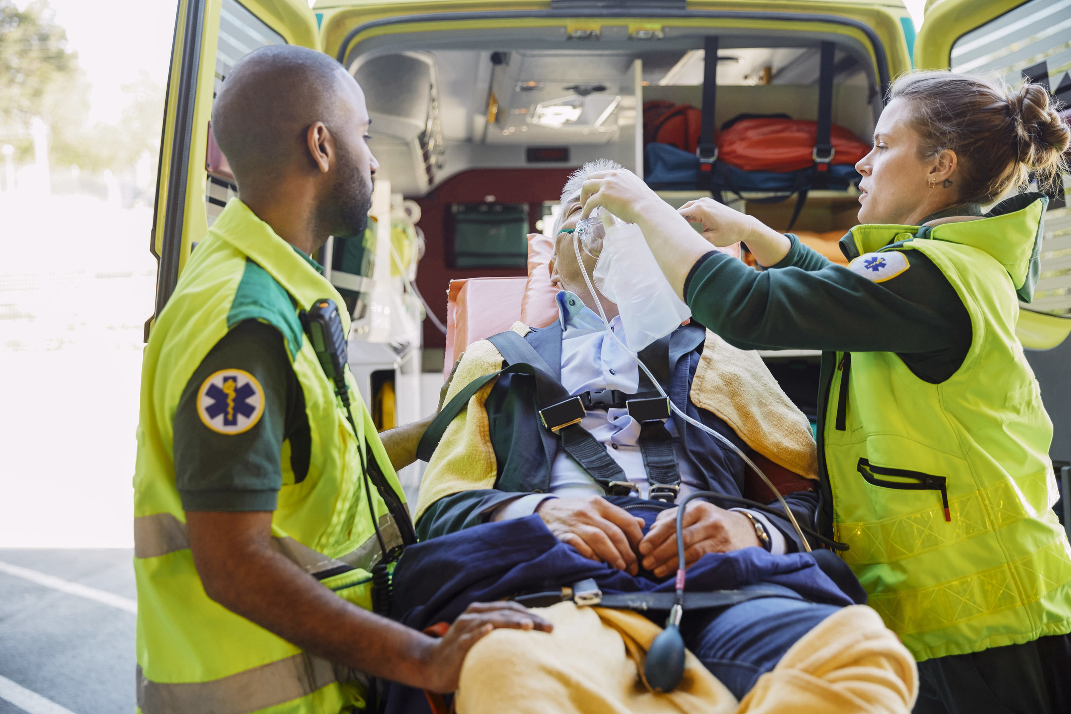 Paramedics working with a patient