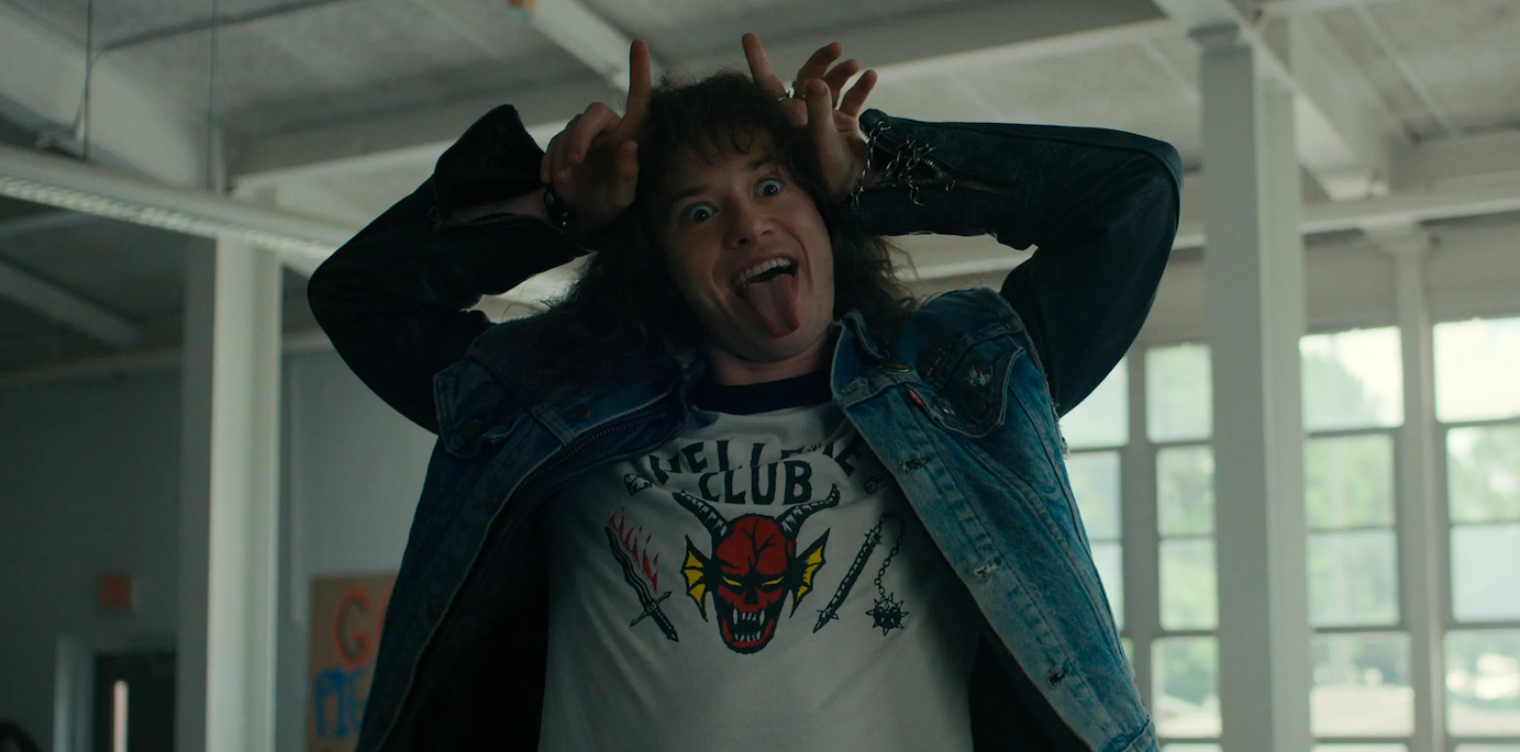 Eddie goofing around in his Hellfire Club T-shirt