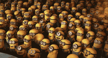 A GIF of a group of yellow minions cheering