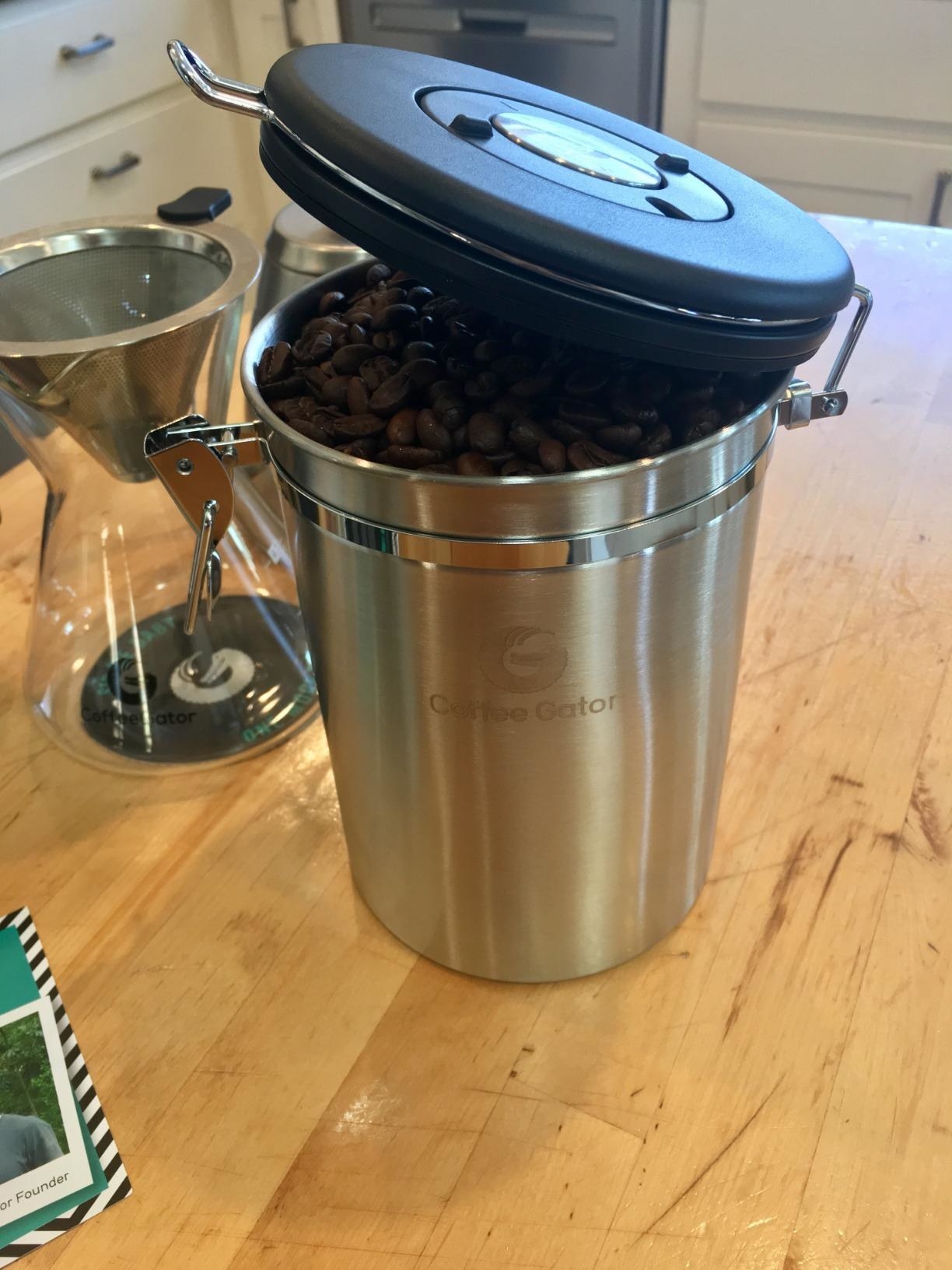 Reviewer image of coffee canister with coffee beans in it