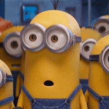 A GIF of shocked minions